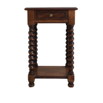 Wooden side table with spiral legs on a white background